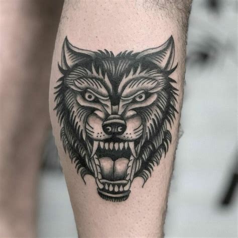 traditional wolf head|traditional wolf tattoo designs men.